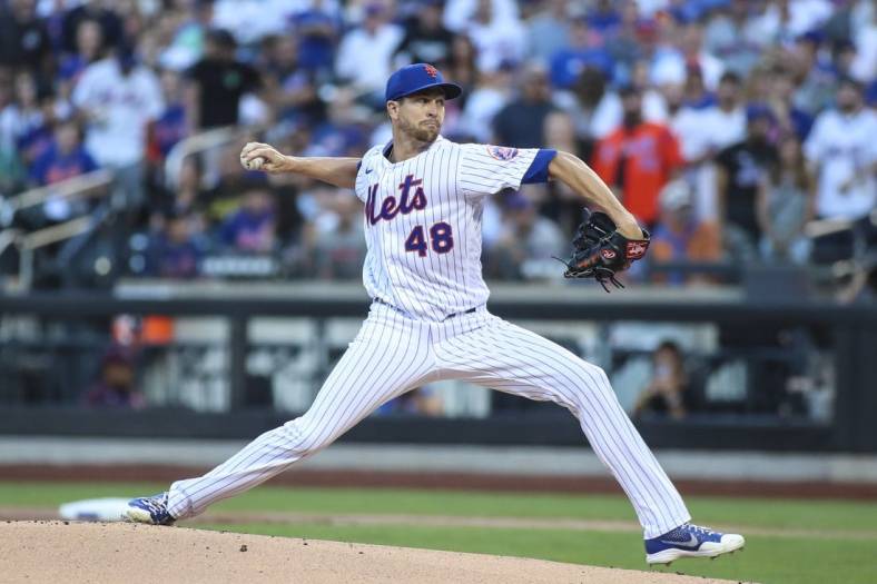 Aug 13, 2022; New York City, New York, USA;  New York Mets starting pitcher Jacob deGrom (48) pitches in the first inning against the Philadelphia Phillies at Citi Field. Mandatory Credit: Wendell Cruz-USA TODAY Sports