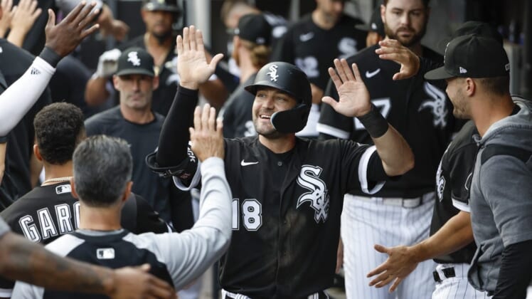 Aug 13, 2022; Chicago, Illinois, USA; Chicago White Sox left fielder AJ Pollock (18) celebrates with teammates after scoring against the Detroit Tigers during the first inning at Guaranteed Rate Field. Mandatory Credit: Kamil Krzaczynski-USA TODAY Sports