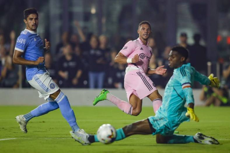 Aug 13, 2022; Fort Lauderdale, Florida, USA; Inter Miami CF defender Kieran Gibbs (middle) watches as his shot goes wide against the New York City FC during the first half at DRV PNK Stadium. Mandatory Credit: Sam Navarro-USA TODAY Sports