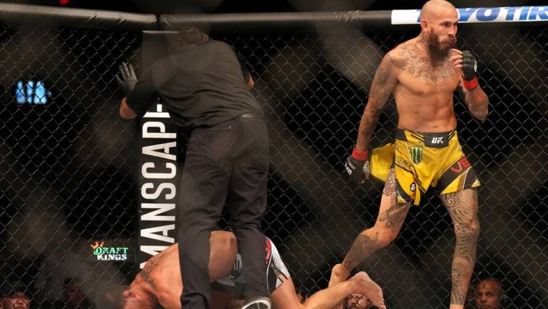 Aug 13, 2022; San Diego, California, USA; Marlon Vera (red gloves) reacts after defeating Dominick Cruz (blue gloves) during UFC Fight Night at Pechanga Arena. Mandatory Credit: Joe Camporeale-USA TODAY Sports