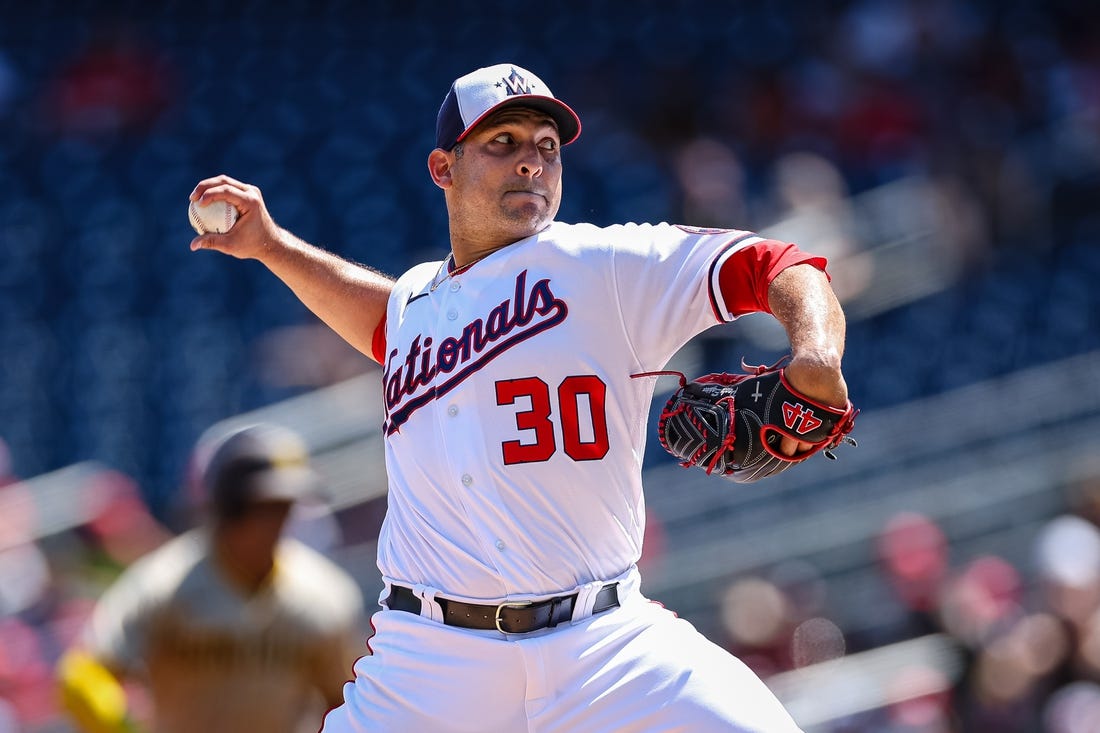 Aug 14, 2022; Washington, District of Columbia, USA; Washington Nationals starting pitcher Paolo Espino (30) pitches against the San Diego Padres during the first inning at Nationals Park. Mandatory Credit: Scott Taetsch-USA TODAY Sports