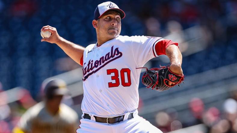 Aug 14, 2022; Washington, District of Columbia, USA; Washington Nationals starting pitcher Paolo Espino (30) pitches against the San Diego Padres during the first inning at Nationals Park. Mandatory Credit: Scott Taetsch-USA TODAY Sports