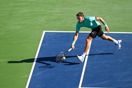 Aug 14, 2022; Montreal, QC, Canada; Pablo Carreno Busta (ESP) hits a shot against Hubert Hurkacz (POL) (not pictured) in the singles final match during during the National Bank Open at IGA Stadium. Mandatory Credit: David Kirouac-USA TODAY Sports