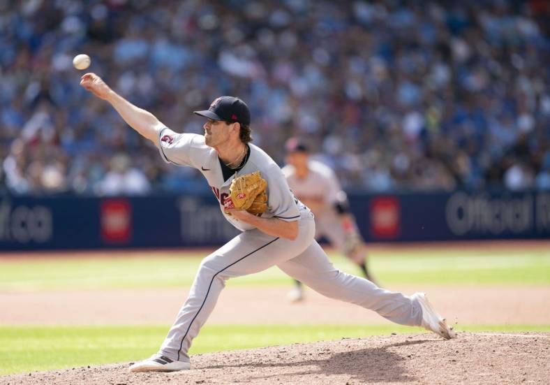 Aug 14, 2022; Toronto, Ontario, CAN; Cleveland Guardians starting pitcher Shane Bieber (57) throws a pitch against the Toronto Blue Jays during the seventh inning at Rogers Centre. Mandatory Credit: Nick Turchiaro-USA TODAY Sports