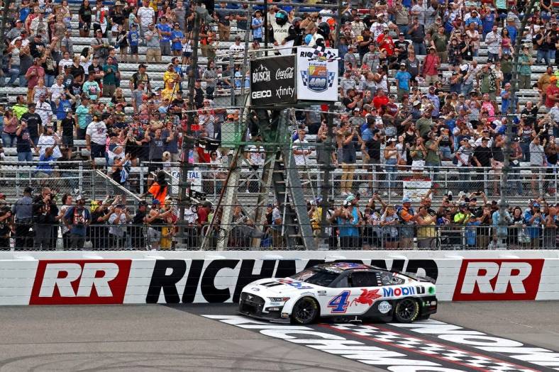 Aug 14, 2022; Richmond, Virginia, USA; NASCAR Cup Series driver Kevin Harvick (4) wins the Federated Auto Part 400 at Richmond International Raceway. Mandatory Credit: Peter Casey-USA TODAY Sports