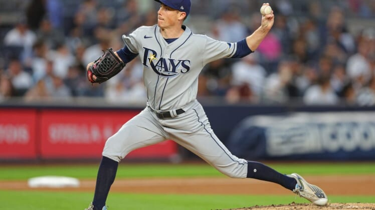 Aug 15, 2022; Bronx, New York, USA; Tampa Bay Rays relief pitcher Ryan Yarbrough (48) delivers a pitch during the third inning against the New York Yankees at Yankee Stadium. Mandatory Credit: Vincent Carchietta-USA TODAY Sports