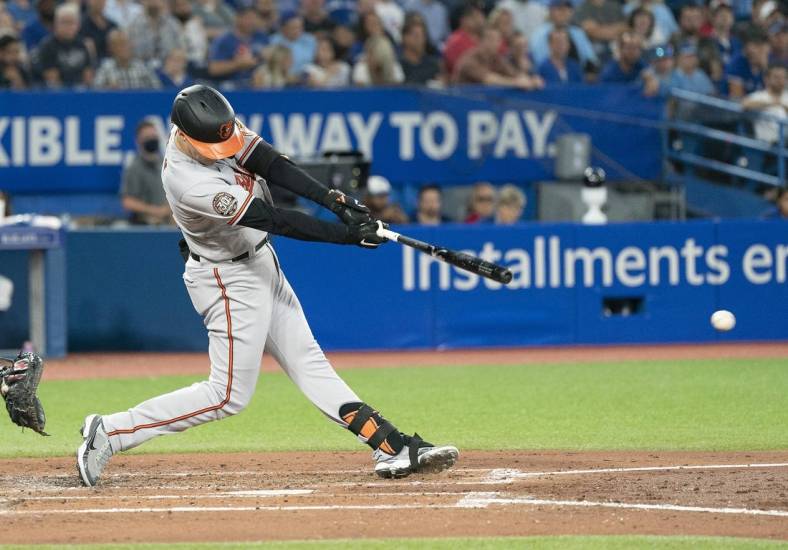 Aug 15, 2022; Toronto, Ontario, CAN; Baltimore Orioles designated hitter Tyler Nevin (41) reaches base on a fielders choice RBI against the Toronto Blue Jays during the fourth inning at Rogers Centre. Mandatory Credit: Nick Turchiaro-USA TODAY Sports