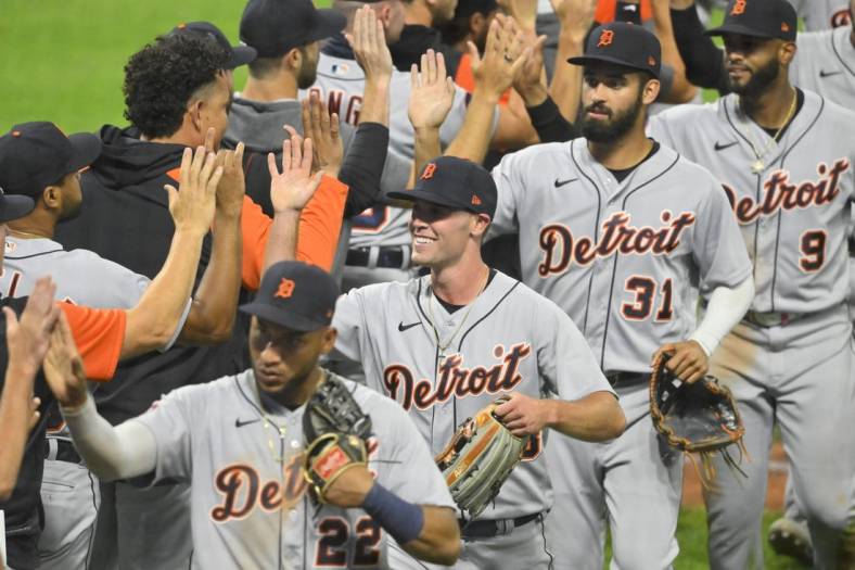 Aug 15, 2022; Cleveland, Ohio, USA; Detroit Tigers players celebrate a win over the Cleveland Guardians at Progressive Field. Mandatory Credit: David Richard-USA TODAY Sports