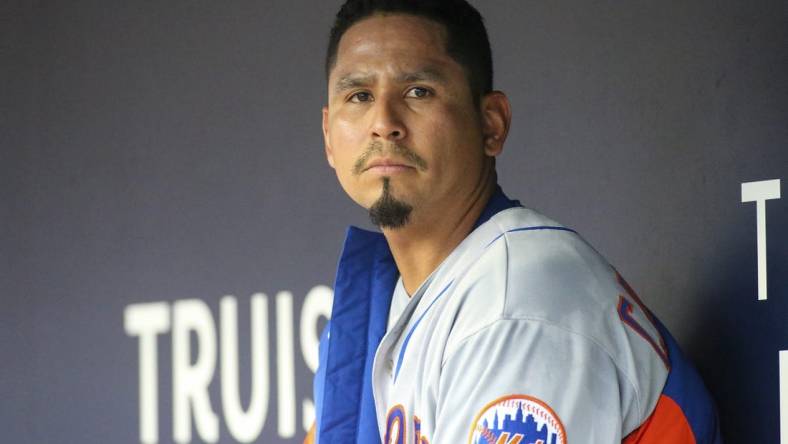 Aug 15, 2022; Atlanta, Georgia, USA; New York Mets starting pitcher Carlos Carrasco (59) in the dugout against the Atlanta Braves in the first inning at Truist Park. Mandatory Credit: Brett Davis-USA TODAY Sports