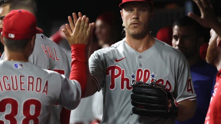 Aug 15, 2022; Cincinnati, Ohio, USA; Philadelphia Phillies starting pitcher Noah Syndergaard (43) reacts with teammates in the dugout after leaving the game in the eighth inning at Great American Ball Park. Mandatory Credit: David Kohl-USA TODAY Sports