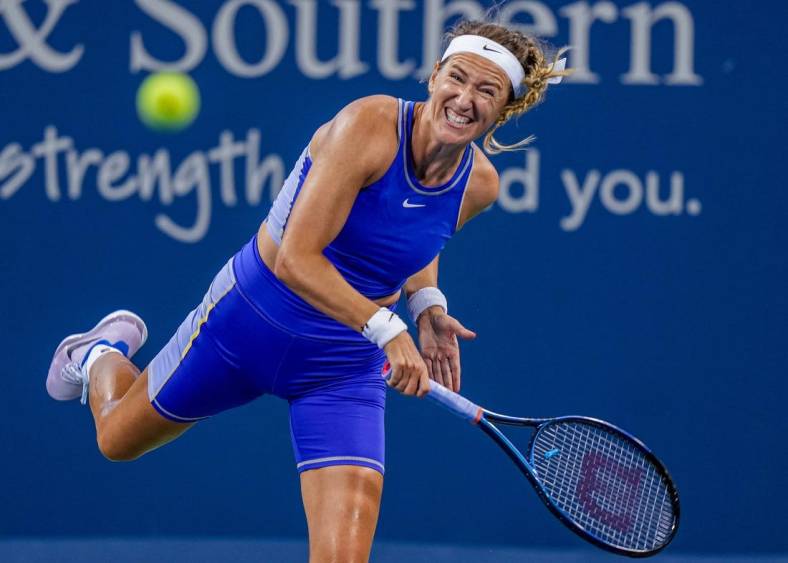 Victoria Azarenka makes a hit to Kaia Kanepi on Grand Stand court during the Western & Southern Open at the Lindner Family Tennis Center in Mason Monday, August 15, 2022.  Azarenka won 6-3, 4-6, 6-3.

Monday Tennis10