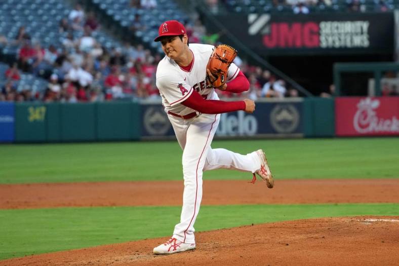 Aug 15, 2022; Anaheim, California, USA;  Los Angeles Angels starting pitcher Shohei Ohtani (17) delivers a pitch in the second inning against the Seattle Mariners at Angel Stadium. Mandatory Credit: Kirby Lee-USA TODAY Sports