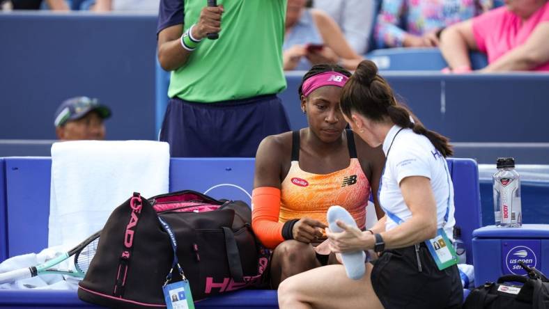 Coco Gauff is tended to between games after falling during her match against Marle Bouzkova.

Syndication The Enquirer