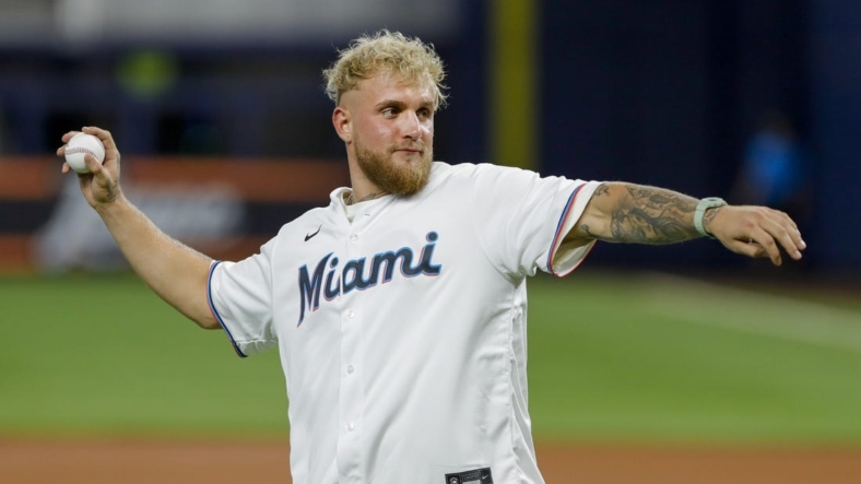 Aug 16, 2022; Miami, Florida, USA; YouTube personality and boxer Jake Paul throws a ceremonial first pitch prior to the game between the Miami Marlins and the San Diego Padres at loanDepot Park. Mandatory Credit: Sam Navarro-USA TODAY Sports
