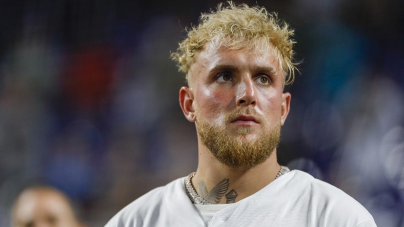 Aug 16, 2022; Miami, Florida, USA; YouTube personality and boxer Jake Paul listens to the national anthem prior to the game between the Miami Marlins and the San Diego Padres at loanDepot Park. Mandatory Credit: Sam Navarro-USA TODAY Sports