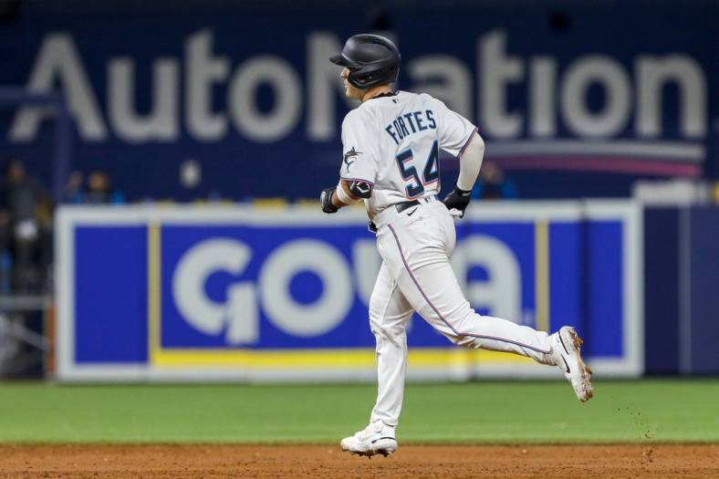 Nick Fortes of the Miami Marlins rounds the bases after connecting News  Photo - Getty Images