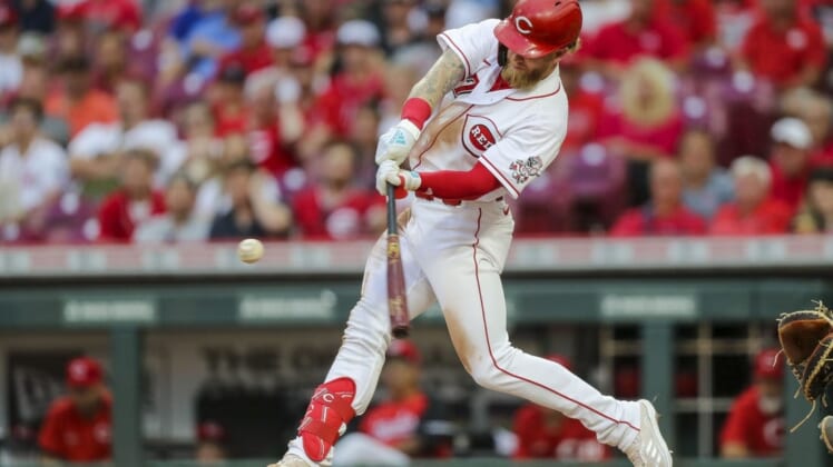 Aug 16, 2022; Cincinnati, Ohio, USA; Cincinnati Reds designated hitter Jake Fraley (27) hits a two-run home run in the third inning against against the Philadelphia Phillies at Great American Ball Park. Mandatory Credit: Katie Stratman-USA TODAY Sports