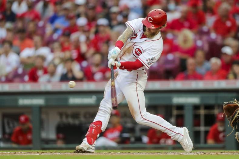 Aug 16, 2022; Cincinnati, Ohio, USA; Cincinnati Reds designated hitter Jake Fraley (27) hits a two-run home run in the third inning against against the Philadelphia Phillies at Great American Ball Park. Mandatory Credit: Katie Stratman-USA TODAY Sports