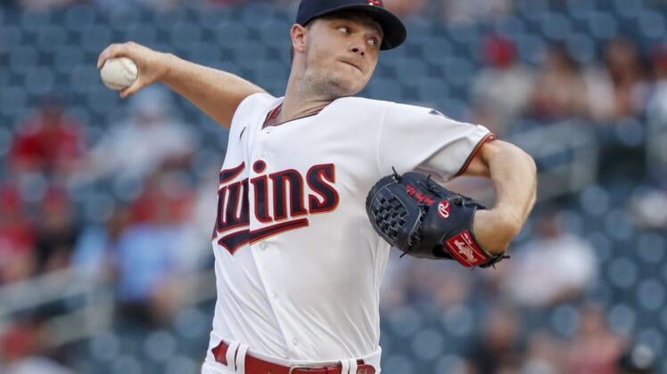 Aug 16, 2022; Minneapolis, Minnesota, USA; Minnesota Twins starting pitcher Sonny Gray (54) throws to the Kansas City Royals in the first inning at Target Field. Mandatory Credit: Bruce Kluckhohn-USA TODAY Sports