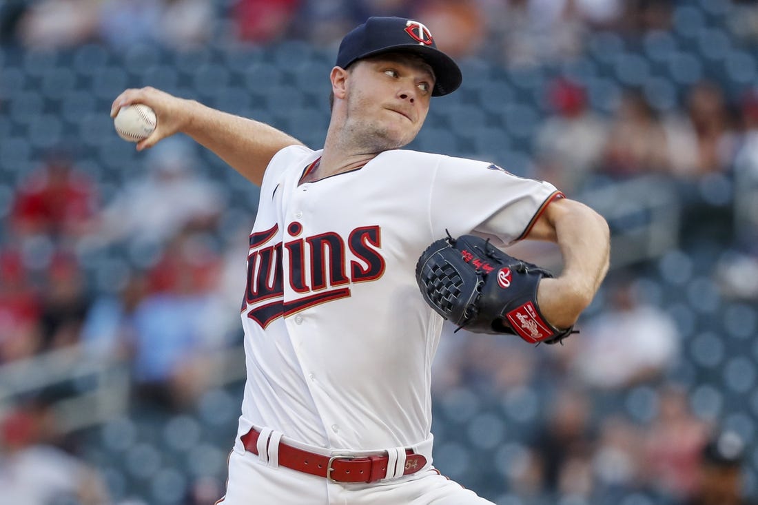 Aug 16, 2022; Minneapolis, Minnesota, USA; Minnesota Twins starting pitcher Sonny Gray (54) throws to the Kansas City Royals in the first inning at Target Field. Mandatory Credit: Bruce Kluckhohn-USA TODAY Sports