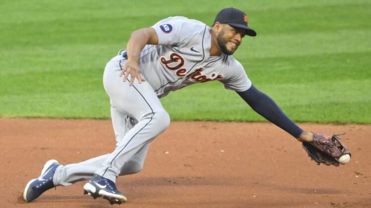 Aug 16, 2022; Cleveland, Ohio, USA; Detroit Tigers third baseman Jeimer Candelario (46) reaches for the ball on a base hit in the third inning against the Cleveland Guardians at Progressive Field. Mandatory Credit: David Richard-USA TODAY Sports