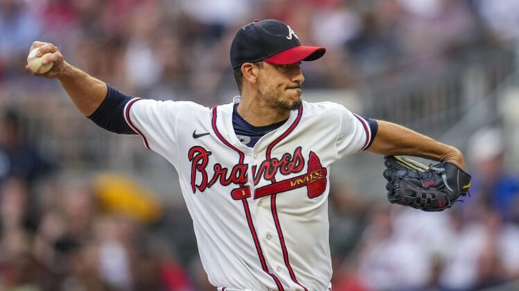 Aug 16, 2022; Cumberland, Georgia, USA; Atlanta Braves starting pitcher Charlie Morton (50) pitches against the New York Mets during the second inning at Truist Park. Mandatory Credit: Dale Zanine-USA TODAY Sports