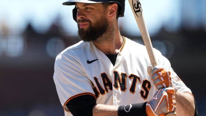 Aug 14, 2022; San Francisco, California, USA; San Francisco Giants first baseman Brandon Belt (9) bats during the first inning against the Pittsburgh Pirates at Oracle Park. Mandatory Credit: Darren Yamashita-USA TODAY Sports