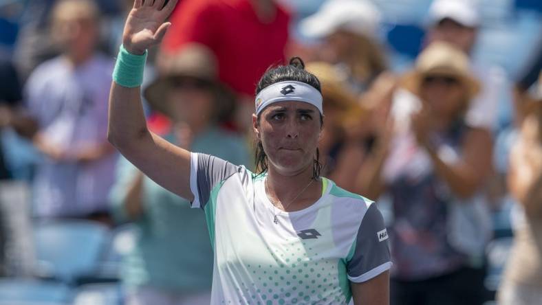 Aug 17, 2022; Cincinnati, OH, USA; Ons Jabeur (TUN) acknowledges the spectators after winning her match against Caty McNally (USA) at the Western & Southern Open at the at the Lindner Family Tennis Center. Mandatory Credit: Susan Mullane-USA TODAY Sports