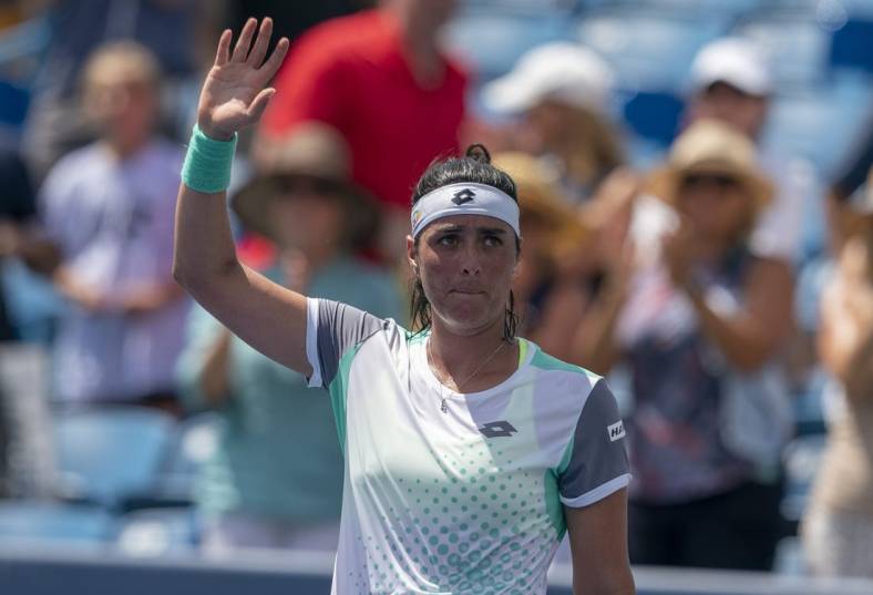 Aug 17, 2022; Cincinnati, OH, USA; Ons Jabeur (TUN) acknowledges the spectators after winning her match against Caty McNally (USA) at the Western & Southern Open at the at the Lindner Family Tennis Center. Mandatory Credit: Susan Mullane-USA TODAY Sports