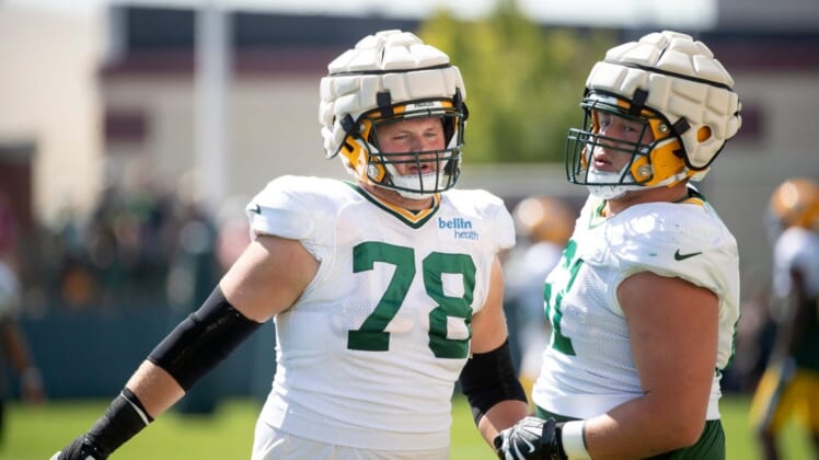 Green Bay Packers tackle/guard Cole Van Lanen (78) and Josh Myers (71) participate in training camp practice with the New Orleans Saints on Wednesday, Aug. 17, 2022, at Ray Nitschke Field in Ashwaubenon, Wis. Samantha Madar/USA TODAY NETWORK-WisconsinGpg Training Camp With Saints 08172022 0009