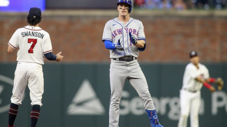 Aug 17, 2022; Atlanta, Georgia, USA; New York Mets left fielder Mark Canha (19) celebrates after a double against the Atlanta Braves in the second inning at Truist Park. Mandatory Credit: Brett Davis-USA TODAY Sports