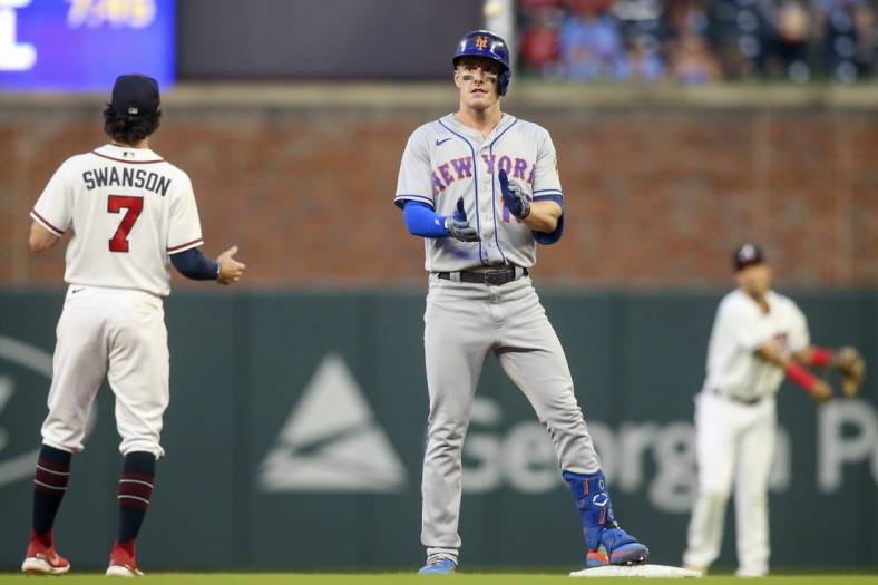 Aug 17, 2022; Atlanta, Georgia, USA; New York Mets left fielder Mark Canha (19) celebrates after a double against the Atlanta Braves in the second inning at Truist Park. Mandatory Credit: Brett Davis-USA TODAY Sports