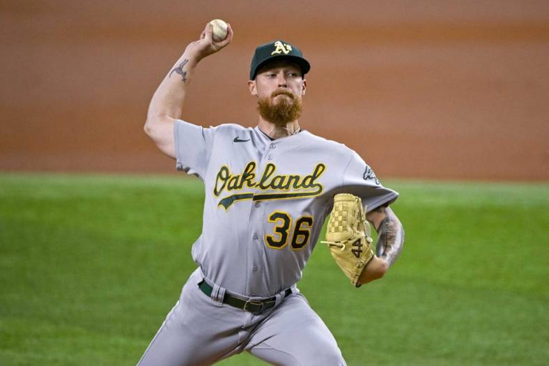 Aug 17, 2022; Arlington, Texas, USA; Oakland Athletics starting pitcher Adam Oller (36) pitches against the Texas Rangers during the first inning at Globe Life Field. Mandatory Credit: Jerome Miron-USA TODAY Sports