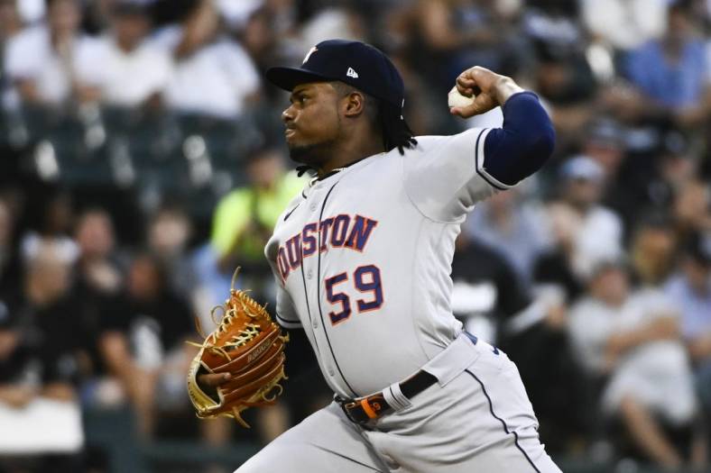 Aug 17, 2022; Chicago, Illinois, USA;  Houston Astros starting pitcher Framber Valdez (59) pitches against the Chicago White Sox during the first inning at Guaranteed Rate Field. Mandatory Credit: Matt Marton-USA TODAY Sports