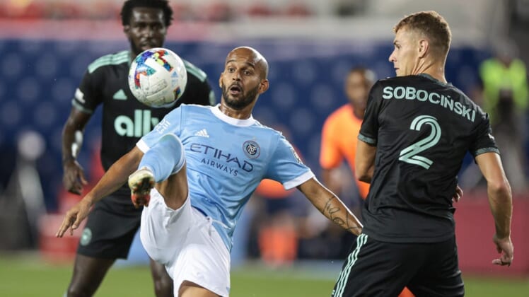 Aug 17, 2022; Harrison, New Jersey, USA; New York City FC forward Heber (9) plays the ball against Charlotte FC defender Jan Sobocinski (2) during the first half at Red Bull Arena. Mandatory Credit: Vincent Carchietta-USA TODAY Sports