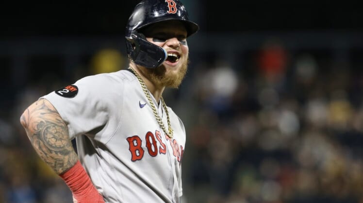 Aug 17, 2022; Pittsburgh, Pennsylvania, USA; Boston Red Sox left fielder Alex Verdugo (99) reacts while on third base against the Pittsburgh Pirates during the eighth inning at PNC Park. Mandatory Credit: Charles LeClaire-USA TODAY Sports