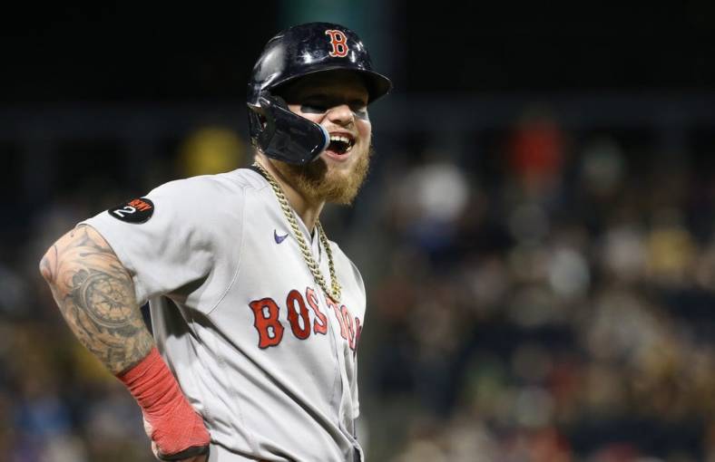 Aug 17, 2022; Pittsburgh, Pennsylvania, USA; Boston Red Sox left fielder Alex Verdugo (99) reacts while on third base against the Pittsburgh Pirates during the eighth inning at PNC Park. Mandatory Credit: Charles LeClaire-USA TODAY Sports