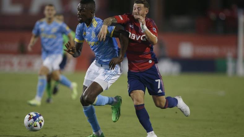 Aug 17, 2022; Frisco, Texas, USA; Philadelphia Union forward Cory Burke (19) controls the ball against FC Dallas forward Paul Arriola (7) in the first half at Toyota Stadium. Mandatory Credit: Tim Heitman-USA TODAY Sports