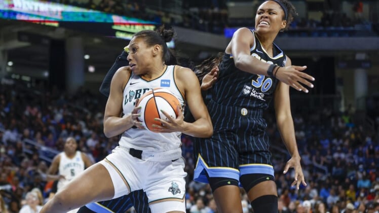 Aug 17, 2022; Chicago, Illinois, USA; New York Liberty forward Betnijah Laney (44) goes to the basket against Chicago Sky forward Azura Stevens (30) during the second half of game one of the first round of the WNBA playoffs at Wintrust Arena. Mandatory Credit: Kamil Krzaczynski-USA TODAY Sports