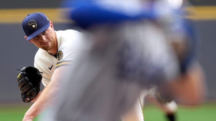 Milwaukee Brewers starting pitcher Eric Lauer (52) throws  during the first inning of their game against the Los Angeles Dodgers Wednesday, August 17, 2022 at American Family Field in Milwaukee, Wis.Brewers17 1