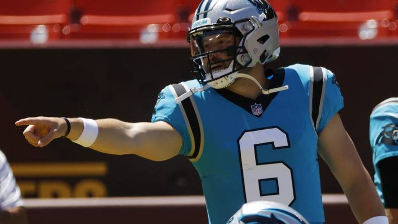 Aug 13, 2022; Landover, Maryland, USA; Carolina Panthers quarterback Baker Mayfield (6) participates in warmups prior to the game against the Washington Commanders at FedExField. Mandatory Credit: Geoff Burke-USA TODAY Sports