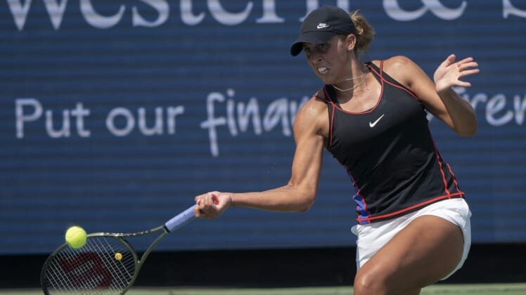 Aug 18, 2022; Cincinnati, OH, USA; Madison Keys (USA) returns a shot during her match against Iga Swiatek (POL) at the Western & Southern Open at the at the Lindner Family Tennis Center. Mandatory Credit: Susan Mullane-USA TODAY Sports