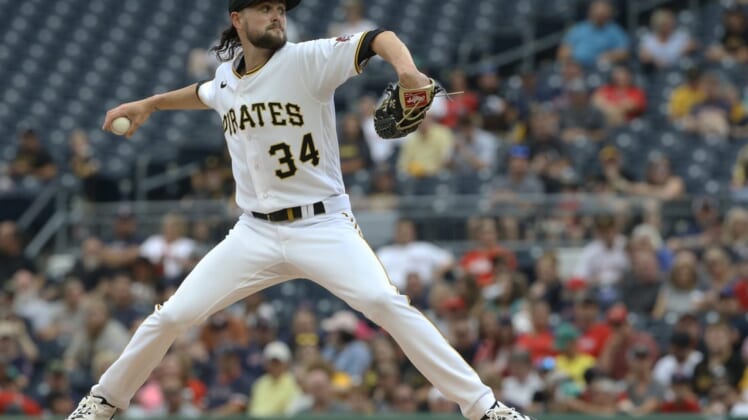 Aug 18, 2022; Pittsburgh, Pennsylvania, USA;  Pittsburgh Pirates starting pitcher JT Brubaker (34) delivers a pitch against the Boston Red Sox during the first inning at PNC Park. Mandatory Credit: Charles LeClaire-USA TODAY Sports