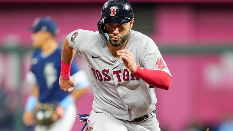 Aug 5, 2022; Kansas City, Missouri, USA; Boston Red Sox first baseman Eric Hosmer (35) runs toward third base during the sixth inning against the Kansas City Royals at Kauffman Stadium. Mandatory Credit: Jay Biggerstaff-USA TODAY Sports