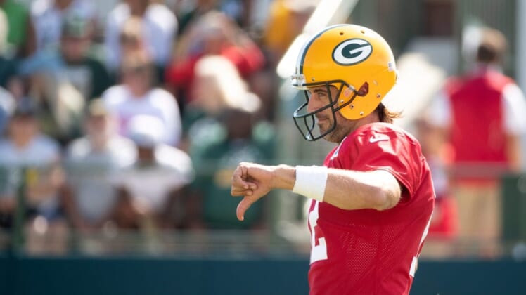 Aaron Rodgers gives a thumbs-down during practice at Ray Nitschke Field on Aug. 16.Syndication Packersnews