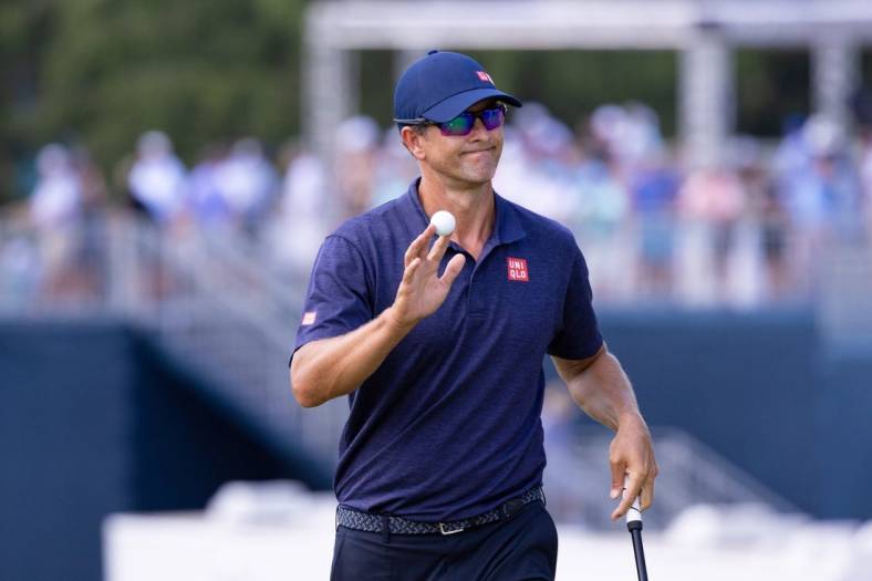 Aug 19, 2022; Wilmington, Delaware, USA; Adam Scott reacts after his birdie putt on the sixth hole during the second round of the BMW Championship golf tournament. Mandatory Credit: Bill Streicher-USA TODAY Sports