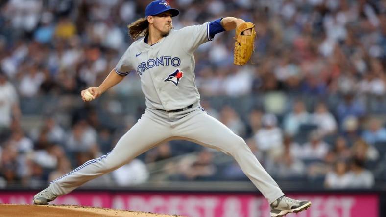 Aug 19, 2022; Bronx, New York, USA; Toronto Blue Jays starting pitcher Kevin Gausman (34) pitches against the New York Yankees during the first inning at Yankee Stadium. Mandatory Credit: Brad Penner-USA TODAY Sports