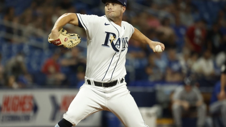Aug 19, 2022; St. Petersburg, Florida, USA;  Tampa Bay Rays starting pitcher Shane McClanahan (18) throws a pitch against the Kansas City Royals during the second inning at Tropicana Field. Mandatory Credit: Kim Klement-USA TODAY Sports