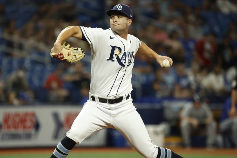 Aug 19, 2022; St. Petersburg, Florida, USA;  Tampa Bay Rays starting pitcher Shane McClanahan (18) throws a pitch against the Kansas City Royals during the second inning at Tropicana Field. Mandatory Credit: Kim Klement-USA TODAY Sports