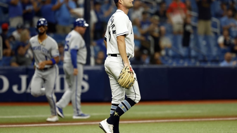 Aug 19, 2022; St. Petersburg, Florida, USA; Tampa Bay Rays starting pitcher Shane McClanahan (18) looks on as he gives up a two run home run against the Kansas City Royals during the third inning at Tropicana Field. Mandatory Credit: Kim Klement-USA TODAY Sports